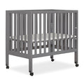 Jett Non-Full Size Folding Convertible Crib, Lightweight Portable Crib, Three Adjustable Mattress Height Settings, Easy to Fold Travel Crib, 1.5” Mattress Pad Included