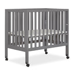 Jett Non-Full Size Folding Convertible Crib, Lightweight Portable Crib, Three Adjustable Mattress Height Settings, Easy to Fold Travel Crib, 1.5” Mattress Pad Included