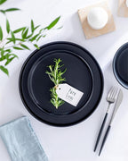 Stoneware dinnerware set 4 persons 12 pcs – Matte black plates and bowls set – Dishwasher, microwave and scratch resistant – Bowl and plate set – Dinner service Pure Living