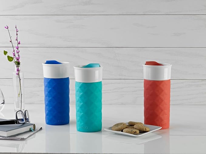 Ello Ogden 16oz Ceramic Travel Mug with Slider Lid and Sleeve, Teal | Splash-resistant ceramic travel mug with slider lid and protective silicone sleeve. BPA-free, great for coffee and tea.