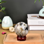 JIC Gem Black and White Tourmaline Crystal Sphere with Wooden Stand,Decorative Crystal Ball Black&White Gemstone Sphere for Meditation,Feng Shui,Witch-Style Decor,Office Table Decorations 70-80mm