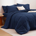 Bedsure Navy King Comforter Set - 7 Pieces Solid King Bed in a Bag, King Bed Set Navy with Quilted Warm Fluffy Comforters, Sheets, Pillowcases & Shams