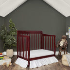 Aden 4-in-1 Convertible Mini Crib In Cherry, Greenguard Gold Certified, Non-Toxic Finish, New Zealand Pinewood, With 3 Mattress Height Settings